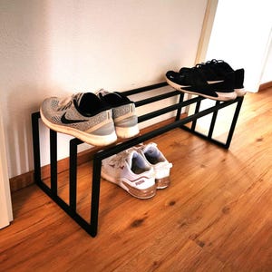 Schuhregal Metalldesign minimalistisch modern