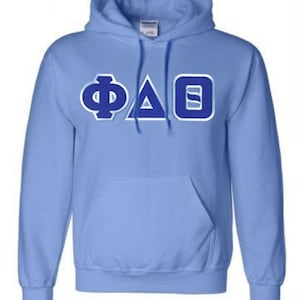 May include: A light blue hooded sweatshirt with the Greek letters Phi Delta Theta in blue outlined in white.