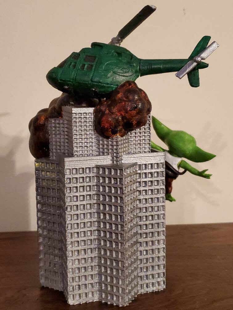 Die Hard tree topper featuring Grogu Etsy