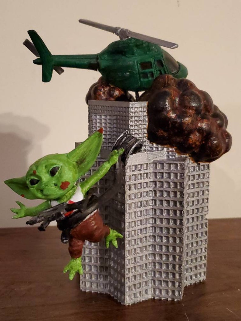 Die Hard tree topper featuring Grogu Etsy