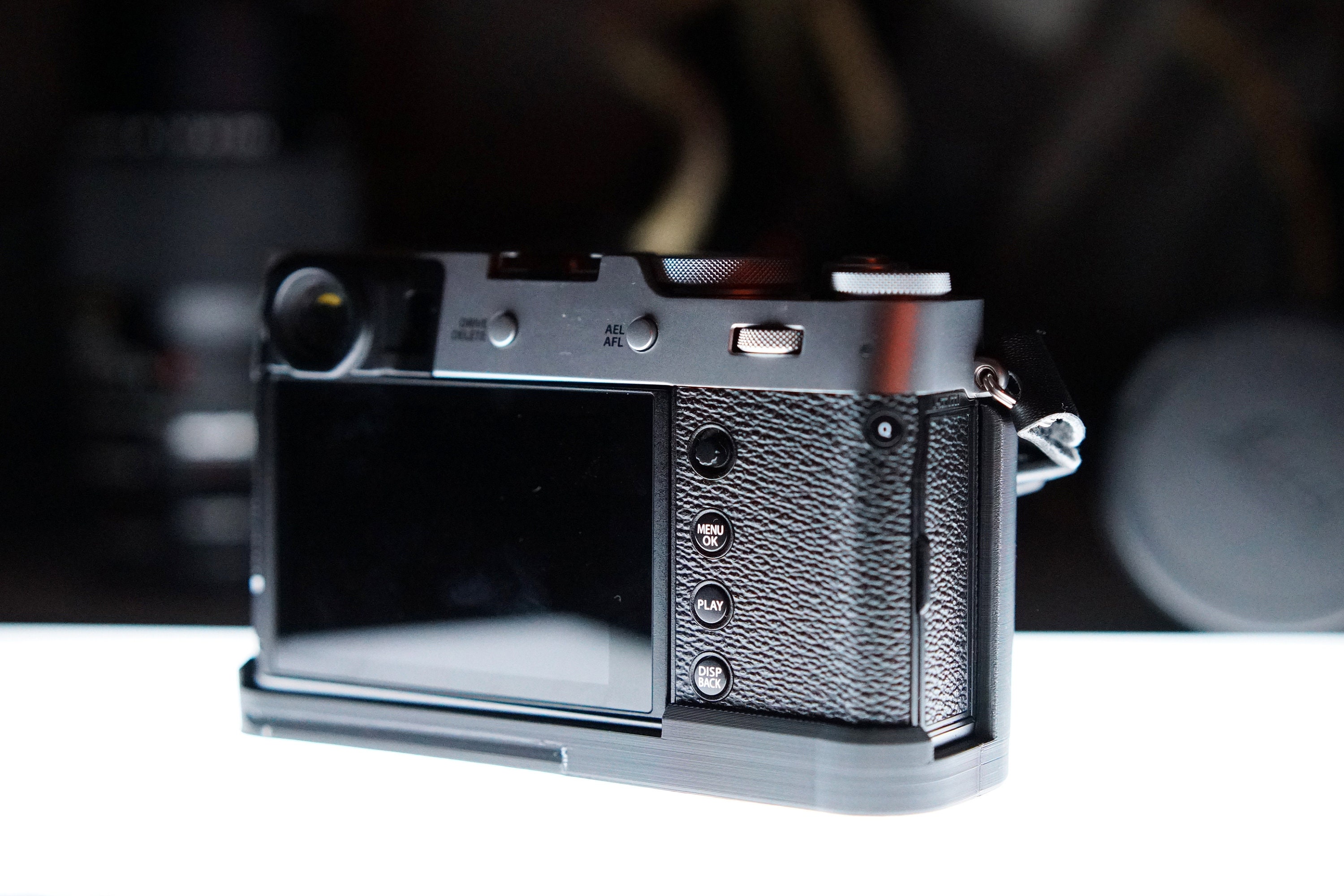 Fujifilm Fuji X100V Camera Grip con soporte para trípode / Impreso
