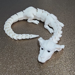 Falkor the luck dragon articulated fidget toy