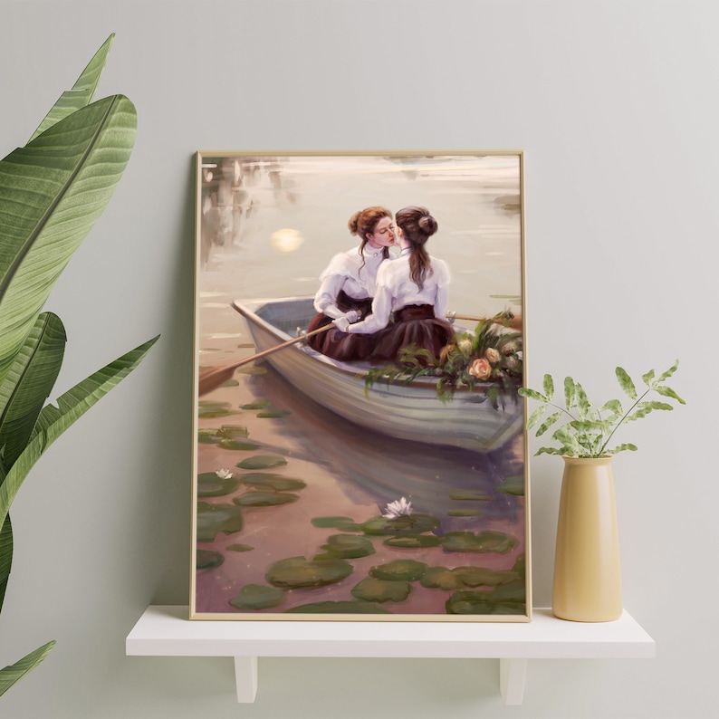 May include: Two people in a white rowboat on a lake with lily pads. They are wearing white shirts and dark skirts. The person in the back is holding a bouquet of flowers.