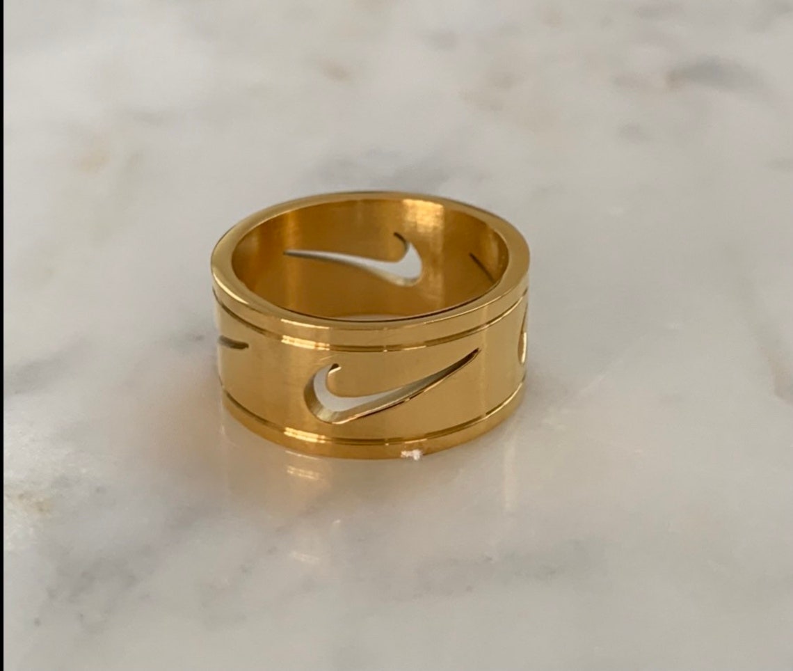 Gold Nike cutout ring | Etsy