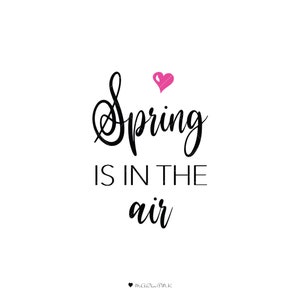 May include: A black and white graphic with the text "Spring is in the air" in a cursive font. A small pink heart is above the word "Spring".