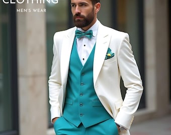 May include: A three-piece suit with a white jacket, teal vest, and teal pants. The suit includes a matching teal bow tie and pocket square. The image also includes the text "ZF CLOTHING MEN'S WEAR".