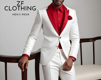 May include: A white suit with a red shirt and a red pocket square. The suit has a shawl collar and a single button closure. The text "ZF CLOTHING MEN'S WEAR" is visible in the top left corner of the image.