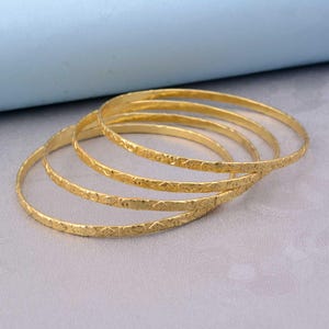 Gold Dipped Brass Stacking Bangles - Set of 7 Semanarios