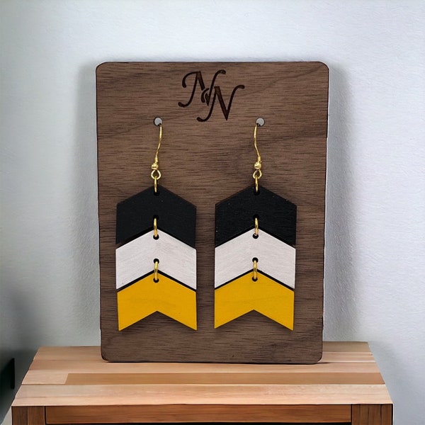 Double sided. Black, white and solid yellow or shimmer. Game day wooden chevron arrow earrings. Team spirit. Hand cut/painted.