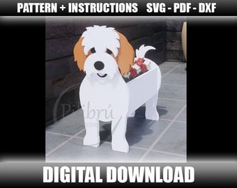 May include: White dog planter with brown ears and a flower pot. The planter is shaped like a dog sitting with its legs outstretched. The flower pot is in the dog's back and has red flowers.
