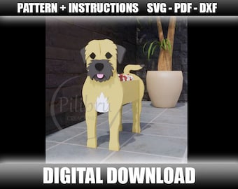 May include: A digital download pattern for a Border Terrier dog. The dog is light tan with a black nose and ears, and a pink tongue. The image includes the text "PATTERN + INSTRUCTIONS SVG - PDF - DXF" and "DIGITAL DOWNLOAD".