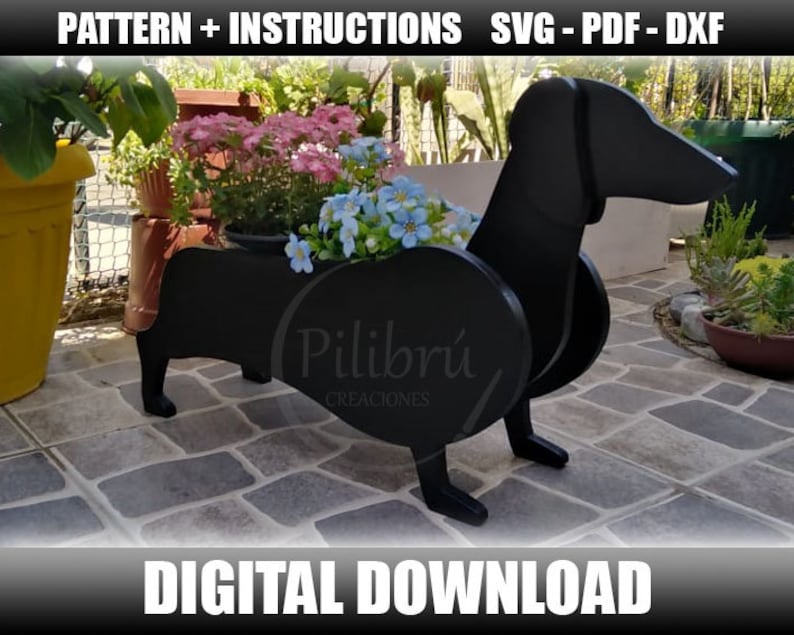 May include: Black wooden dachshund planter with a flower pot in the middle. The planter is sitting on a patio with a stone floor. The text "Pilibri CREACIONES" is visible on the planter.
