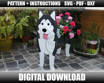 May include: Black and white wooden husky dog planter with pink flowers. The planter is standing on a stone patio. The text "Pilibru CREATIVO" is visible on the planter. The text "DIGITAL DOWNLOAD" is visible at the bottom of the image.