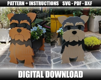 May include: Two wooden planter boxes shaped like Yorkshire Terriers. The planter on the left is brown and black, and the planter on the right is beige and black. Both planters have a flower pot inside.