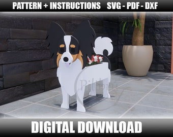 May include: A wooden Papillon dog planter with a white body, black and tan ears, and a white and black tail. The planter has a rectangular opening for flowers and the text "DIGITAL DOWNLOAD".