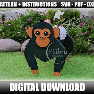 May include: A dark green monkey-shaped garden planter with orange accents. The monkey has a friendly face and is standing on green grass in front of a garden. The text "DIGITAL DOWNLOAD" is at the bottom.