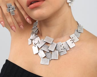 Handmade, silver-plated, geometrically designed boho-style four-piece jewelry set.