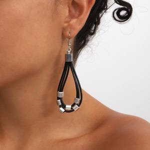 silver plated earrings on leather cord for women.Earrings L:3 inches