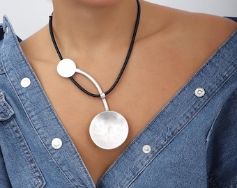 handmade,silver-plated geometric necklace on a leather strap,boho style,necklace length 23 inches