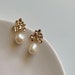 see more listings in the Earring section