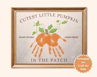 May include: Printable craft for kids featuring a handprint pumpkin with the text "Cutest Little Pumpkin", "Hand-Picked", "Farm Fresh", and "In The Patch".