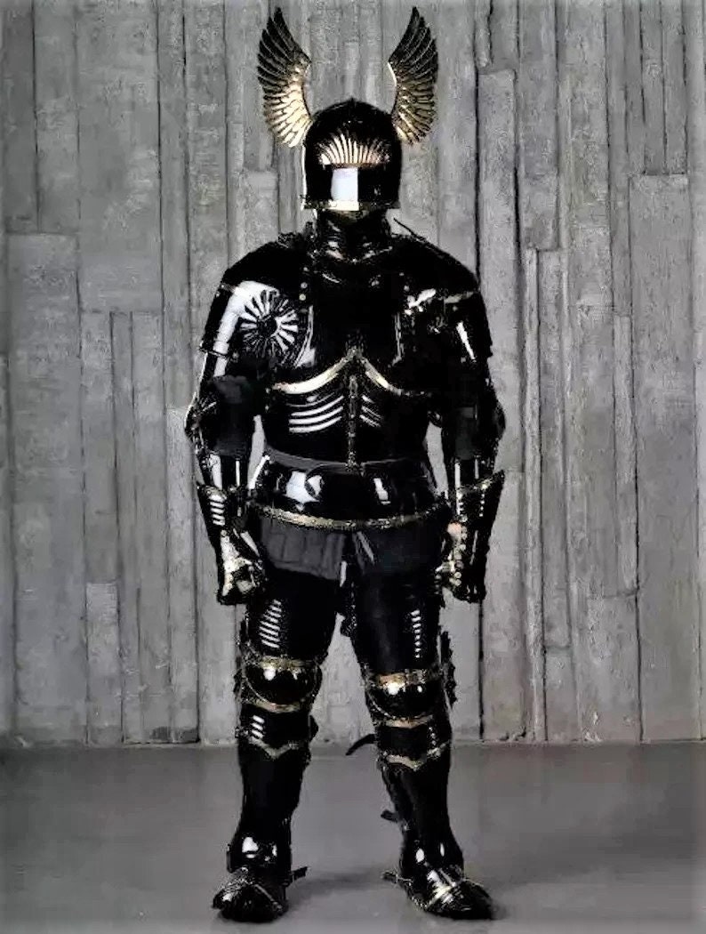May include: A full suit of black armor with gold accents. The armor includes a helmet with a visor and winged helmet crest. The armor is standing on a gray background.