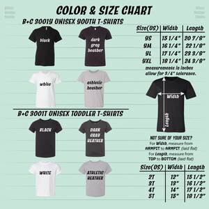 May include: Size chart for youth and toddler unisex t-shirts. The chart shows the different sizes available, along with the corresponding width and length measurements in inches. The colors available are black, white, dark gray heather, and athletic heather.