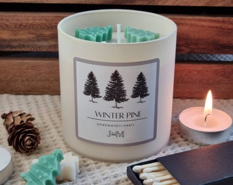 Christmas candle. Winter pine candle. Christmas tree candle. Pine candle.