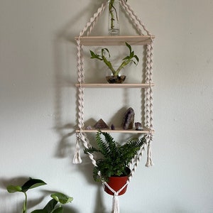 handmade 3 tier wall hanging macrame shelf, with bottom plant hanger.