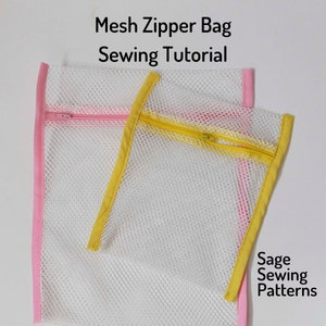 May include: Two mesh zipper bags, one with a pink trim and the other with a yellow trim. The bags are made of white mesh fabric and have zippers on the top. The text "Mesh Zipper Bag Sewing Tutorial" is at the top of the image, and the text "Sage Sewing Patterns" is at the bottom right.