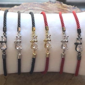 Red/Black Cat Bracelet: Braided Cord, Cubic Zirconia Kitten Charm