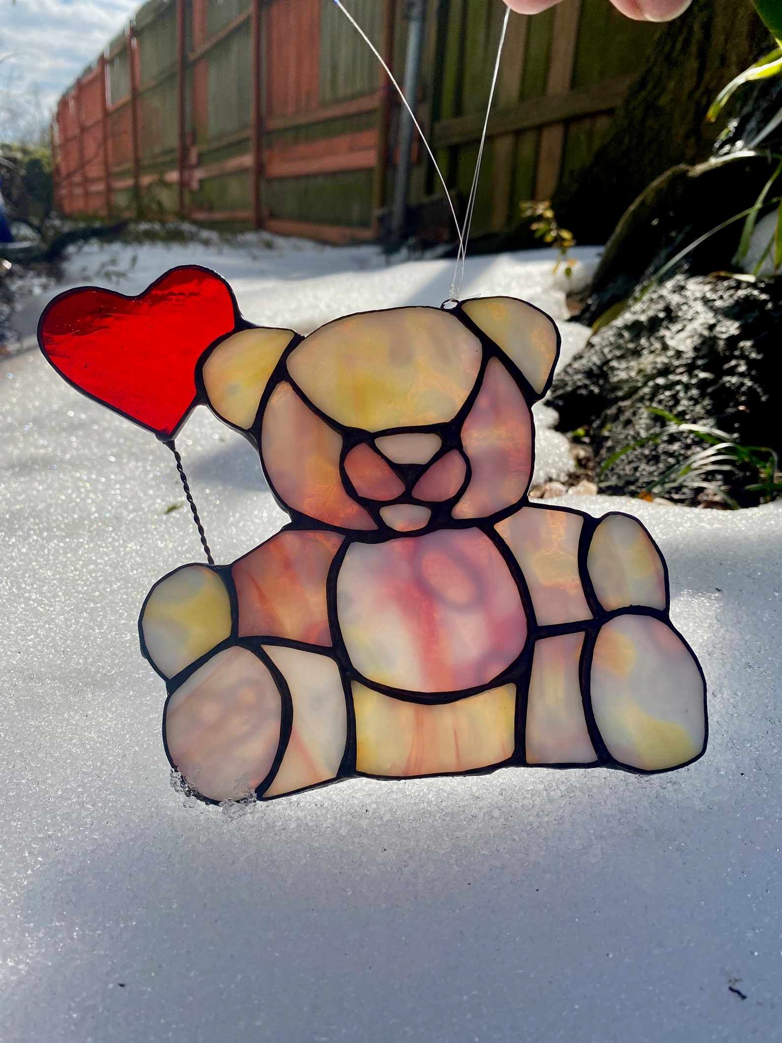 soleil ours en peluche