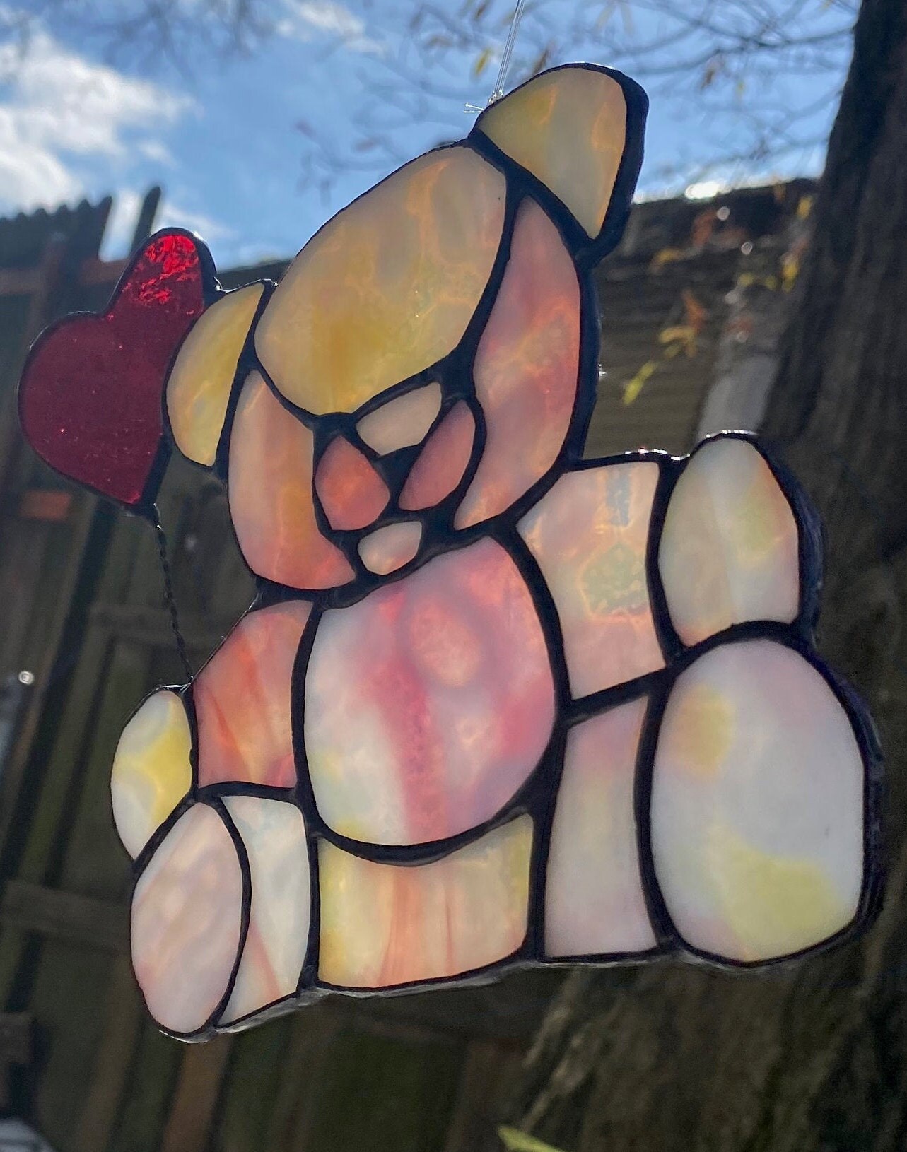 soleil ours en peluche