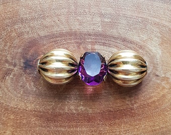 Amethyst glass 1930s brass brooch