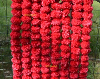Guirnalda de caléndula decorativa hecha a mano con flores artificiales para regalos.