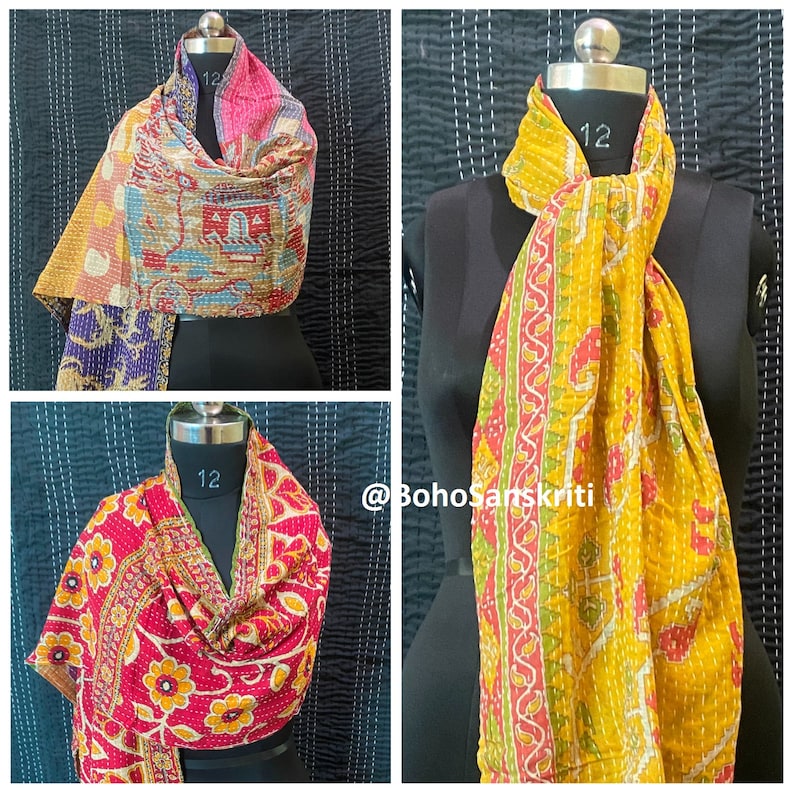 May include: Three colourful kantha quilts, each folded into a scarf shape, with a floral pattern. The quilts are made from recycled saris and are a traditional Indian craft.