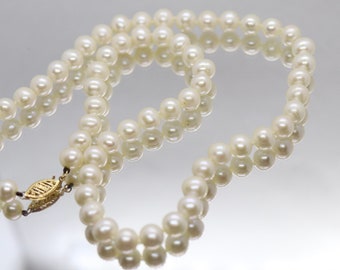 14k fic black pearl necklace top
