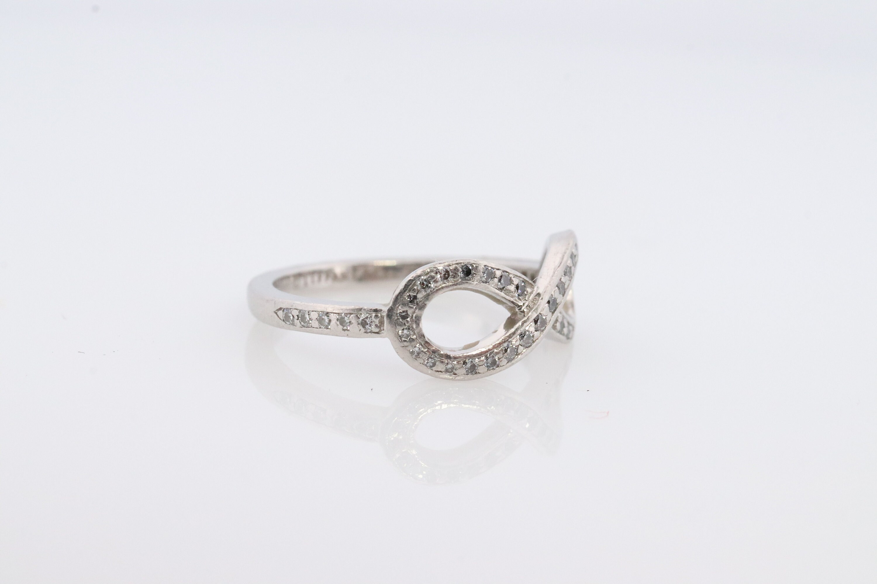 Tiffany and Co. Diamond Ring. Platinum Infinity Diamond Band
