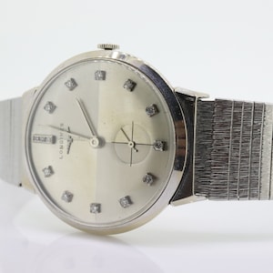 LONGINES WATCH. 14k Longines Diamond Mens Watch with 14 diamond Face. Likely a 22L movement, 1950s RAJAH