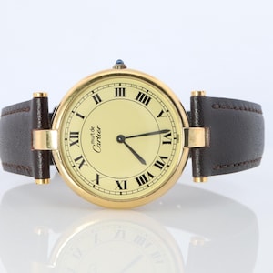Cartier Watch. Must De Cartier Champagne Dial Vendome Round Argent Vermeil 30mm.