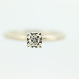 14k Diamond Solitaire. 14k White gold engraved illusion set diamond ring.st(69)