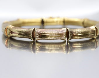 Pulsera de bambú de oro de 18 quilates. Pulsera de bambú articulada con eslabones de gran detalle. 8,25 pulgadas y 25,4 gramos.