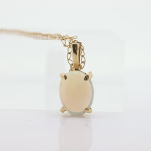 14k Crystal OPAL Pendant. Oval Cabochon Opal charm necklace. Prong set solitaire. st(44)