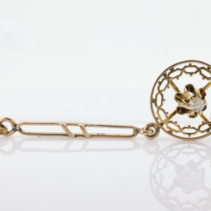 Antique Diamond pendant lavaliere. 10k Gold with a diamond set buttercup. Art nouveau era. st(80)