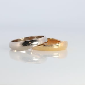 Cartier Love Me Ring. Cartier Stacking Ehering 18k gelbes und weißes Band.