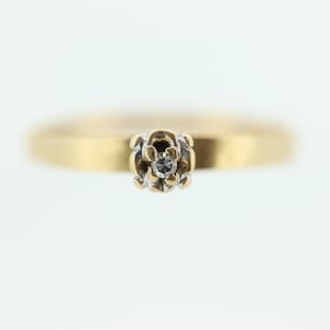 14k Diamond Solitaire. 14k Yellow gold engraved illusion set Daisy diamond ring.