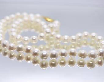 Freshwater Pearl Necklace. 9mm to 10mm Pearls. 20in length