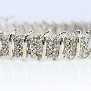 10k Diamond Tennis Bracelet. 10k S-LINK round diamond cluster Tennis bracelet. 3CTW JAFA wide tennis bracelet.