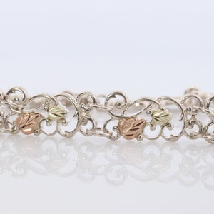 Black Hills Gold Bracelet. STERLING SILVER with 10k Multi-Tone Black Hills Gold Bracelet. Intricate Floral Vine Bracelet.
