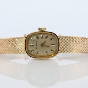 14k MOVADO Mechanical Watch. Movado Vintage Ladies watch with 14k Gold Mesh Bracelet.